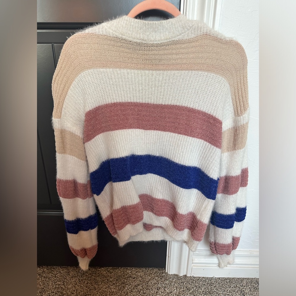 Striped fuzzy sweater worn a few times and great conditions no tears no stains.